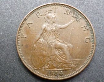 United Kingdom 1934 Farthing coin featuring Britannia, ideal gift or for craft or jewellery making in good used (circulated) condition.