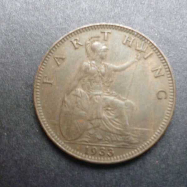 United Kingdom 1933 Farthing coin featuring Britannia, ideal gift or for craft or jewellery making in good used (circulated) condition.