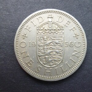 United Kingdom 1956 Shilling coin (English Version) ideal gift or for craft or jewellery making in good used (circulated) condition.