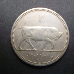1962 Eire (Ireland Republic) Shilling coin featuring a Bull and a Harp, ideal for craft or jewellery making. 1962 Irish one Shilling coin.