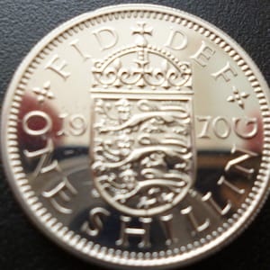 United Kingdom Proof 1970 English One Shilling coin in superb condition housed in a capsule. The final issue of the English Shilling coin.