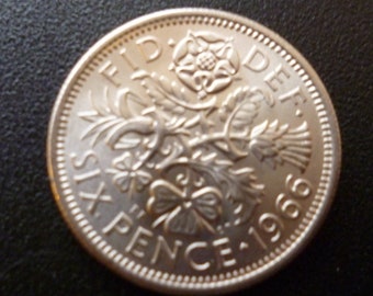 United Kingdom 1966 Sixpence coin in good condition ideal for craft or jewellery making.