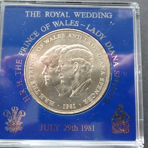 1981 Crown coin, The Royal Wedding of Lady Diana Spencer and Prince Charles in good un-circulated condition housed in a rigid plastic case.