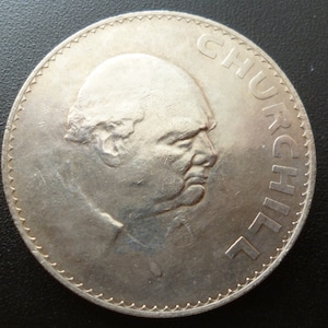 1965 Crown Coin Minted to commemorate the death of Sir Winston Churchill in 1965 in good circulated condition. image 1