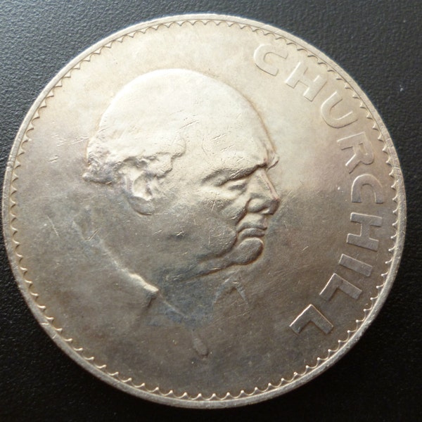 1965 Crown Coin Minted to commemorate the death of Sir Winston Churchill in 1965 in good circulated condition.