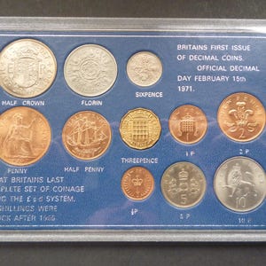Vintage English Complete Decimal Issue and last Pound/Shilling/ Pence coin set housed in rigid plastic case 11 coins in very good condition