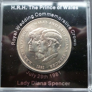 1981 Crown coin, The Royal Wedding of Lady Diana Spencer and Prince Charles in good circulated condition housed in a rigid plastic case.