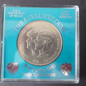 1981 Crown coin, The Royal Wedding of Lady Diana Spencer and Prince Charles in good un-circulated condition housed in a rigid plastic case.