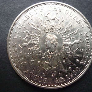1980 Crown featuring the late Queen Elizabeth, issued to commemorate the Queen Mothers 80th Birthday, in good circulated (used) condition.