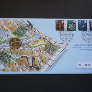 2005 vintage United Kingdom  Coin first Day Cover, Exploring The Menai Straights with an uncirculated one pound coin and four stamps.