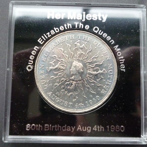 in good condition housed in a near scratch free rigid plastic case. 1980 Crown coin The 80th Birthday of Queen Elizabeth The Queen Mother