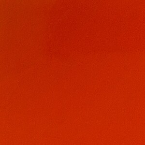 Peut inclure: Un fond orange uni avec une surface l&eacute;g&egrave;rement textur&eacute;e.