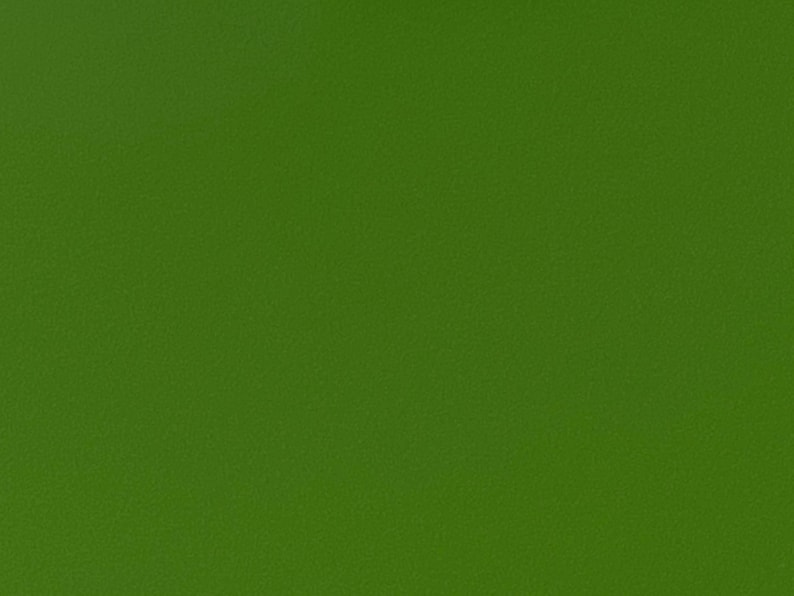 Może przedstawiać: Jednolite zielone tło.