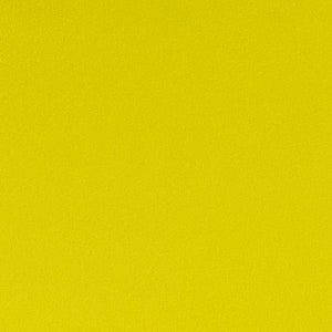 Peut inclure: Un fond jaune uni avec une surface l&eacute;g&egrave;rement textur&eacute;e.