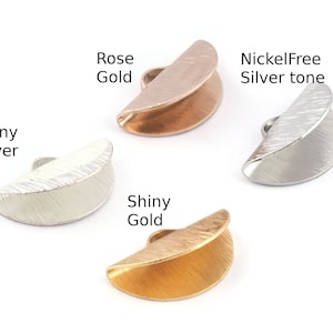 May include: Four half-round metal clasps in different finishes: shiny silver, shiny gold, rose gold, and nickel-free silver tone.