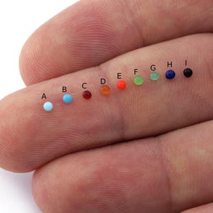 50 cabochons Tsjechisch glas rond 2 mm platte achterkant veelkleurig CAB168 Geen gat CB20