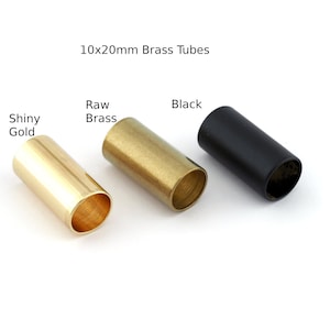 May include: Three 10x20mm brass tubes in different finishes: shiny gold, raw brass, and black.