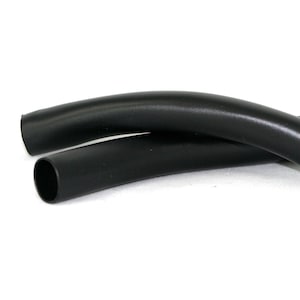 May include: Two black flexible tubes, likely for use in a plumbing or electrical application.