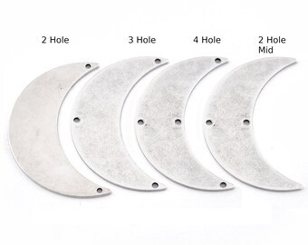 May include: Four silver crescent moon shapes with different numbers of holes. The first has two holes, the second has three holes, the third has four holes, and the last has two holes and the text "2 Hole Mid".