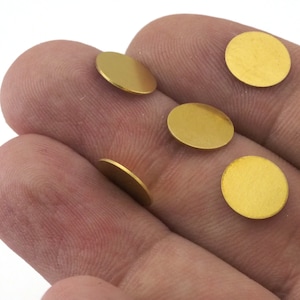 Ronde onafgewerkte stempels 10 mm (0,5 mm dikte) onbewerkte messing bedeltjes 2427-30