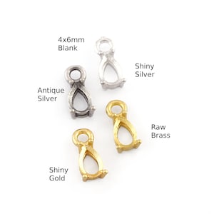 May include: Five 4x6mm pear-shaped bezel settings in different finishes: blank, antique silver, shiny silver, shiny gold, and raw brass.