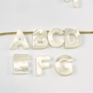 Letras iniciales de nácar 10mm 2.5mm espesor MOP 1493 OPSY