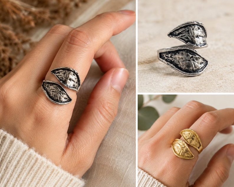 Woman wearing an adjustable antique silver leaf ring on finger, nature inspired botanical statement jewelry.