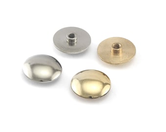 May include: Four metal dome-shaped caps with threaded inserts. The caps are silver, gold, and two shades of silver.