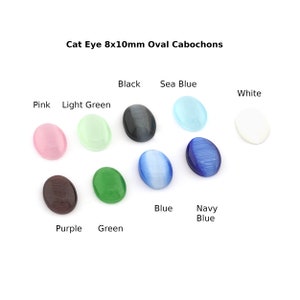 Cabochon oeil de chat ovale en verre 8 x 10 mm à dos plat Rose, vert clair, noir, bleu marine, blanc, violet, vert, bleu, bleu marine CAB158