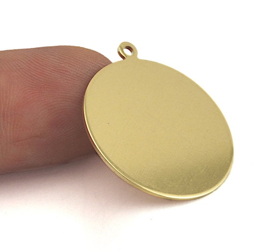 Tag shapped disc pendant Tag shapped disc pendant