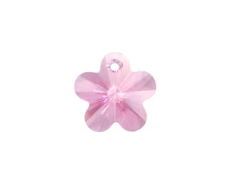 May include: A pink crystal flower charm with a hole for hanging.