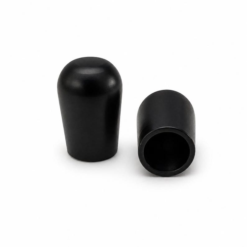 Black painted metal cord end cap for 9mm round leather cord isolated on white background