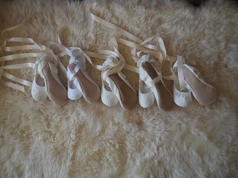 white satin ballerina shoes