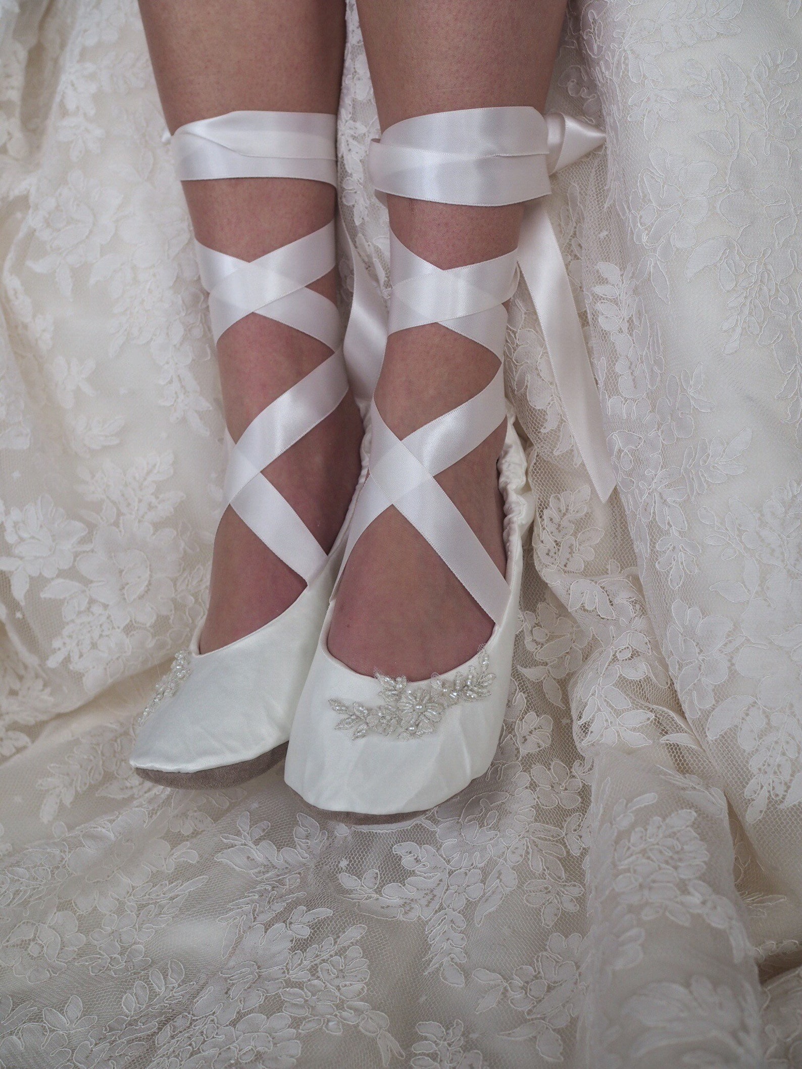 white satin ballet slippers