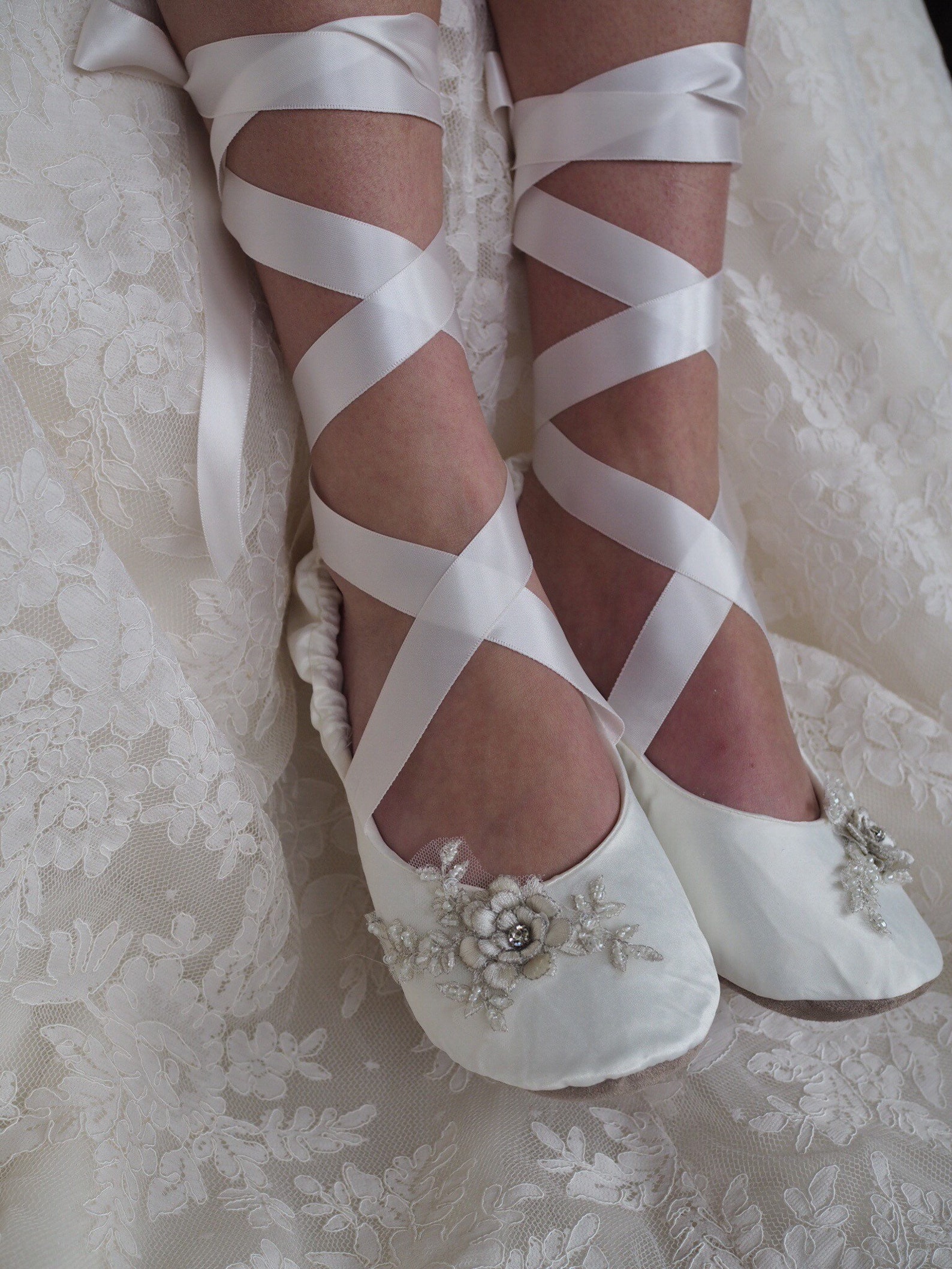 white satin ballet slippers