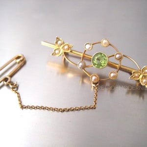 Belle Epoque 15k Gold Peridot and seed Pearl brooch with safety chain, Edwardian