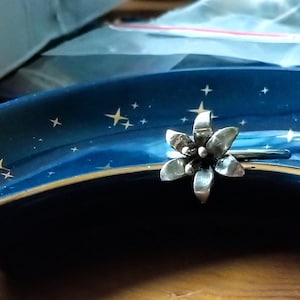 Handmade adjustable sterling silver flower ring