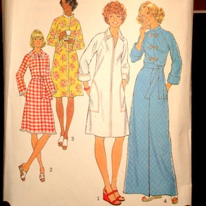 May include: Vintage Simplicity sewing pattern 7238. The pattern features four different dress designs. The pattern size is 10, with a bust size of 32 1/2 inches. The pattern is in a blue and white package.