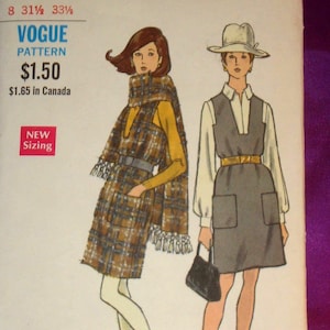 May include: Vintage Vogue pattern envelope featuring illustrations of two women in stylish outfits. The envelope displays the pattern number 7664, size 8, and the Vogue logo. The design includes a plaid cape and a dress with a hat.