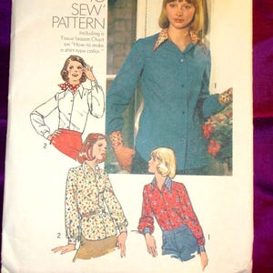 May include: Simplicity sewing pattern 6517 for a shirt, size 14, bust 36 inches. The pattern includes instructions for a shirt-type collar. The cover features illustrations of different shirt styles in various colors and patterns.