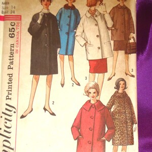 May include: A Simplicity 5103 sewing pattern envelope featuring illustrations of six different coat styles. The designs include various lengths, collar types, and patterns such as solid black, blue, white, brown, red, and a leopard print design.