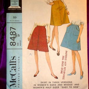 May include: Vintage McCall's sewing pattern for a skirt in three versions. The pattern features illustrations of the skirt in red, yellow, and blue. The pattern is labeled "Easy" and includes sizing information for women's sizes and misses'.
