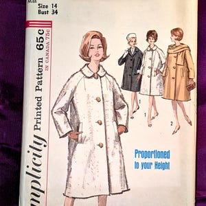 May include: Vintage Simplicity sewing pattern packet featuring a coat design. The packet is white with illustrations of the coat in various colors. Text includes "Size 14 Bust 34" and "Proportioned to your Height."