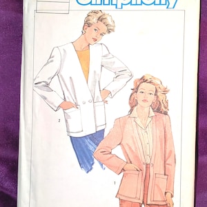 May include: A Simplicity sewing pattern envelope, number 6746, size 18. The front features illustrations of two blazer styles: one white double-breasted jacket with patch pockets and one peach-coloured single-breasted jacket with patch pockets.