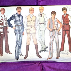 May include: A Simplicity 9087 sewing pattern envelope featuring illustrations of six different outfits for tops, vests, and trousers. The package displays various styles including houndstooth, striped, and solid patterns, with text indicating size 42.