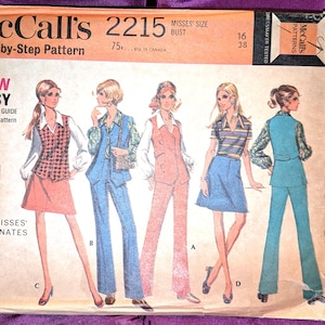 May include: A vintage McCall's 2215 sewing pattern envelope for misses' coordinates. The front features illustrations of five outfits including vests, skirts, and pants. Text includes McCall's 2215, Step-by-Step Pattern, New Easy, and Misses' Coordinates.