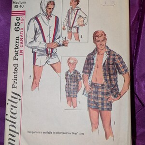 May include: Vintage Simplicity printed pattern 5997. The pattern features illustrations of a hooded jacket and shorts set, and a plaid shirt and shorts set. The pattern is available in medium size 38-40.
