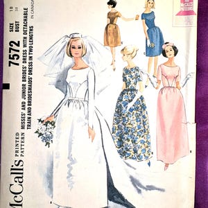 May include: Vintage McCall's sewing pattern 7572 for misses' and junior brides' dresses with detachable train and bridesmaids' dresses in two lengths. The cover features illustrations of the dresses, including a white bridal gown and various bridesmaid dresses.