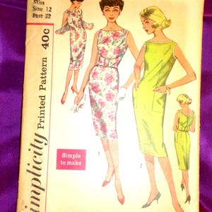 May include: A Simplicity sewing pattern envelope 2991 for a dress in size 12 with a 32-inch bust. The illustration shows two dress variations: one with a floral print and a belt, and one in solid lime green with pockets. Text includes Simple to make.