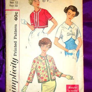 May include: Vintage Simplicity sewing pattern 2974. The pattern features illustrations of three different jacket designs. The cover includes text such as "Miss Size 12 Bust 32" and "Simple to make."